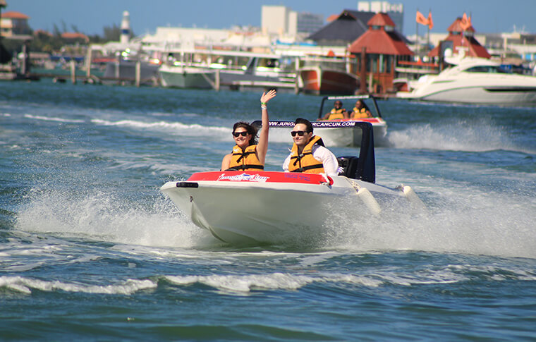 2 people on speedboat