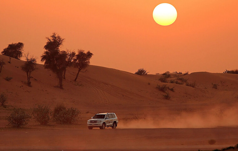 4 wheel drive driving through sand